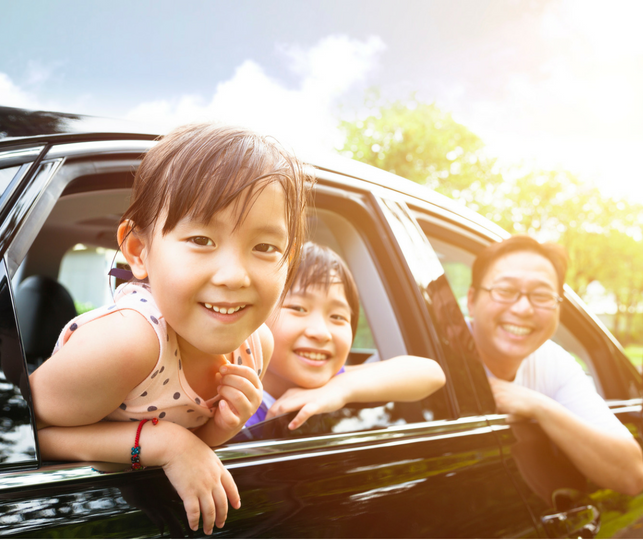 family in car